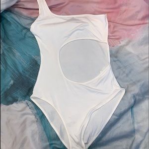 One shoulder and cut out bodysuit